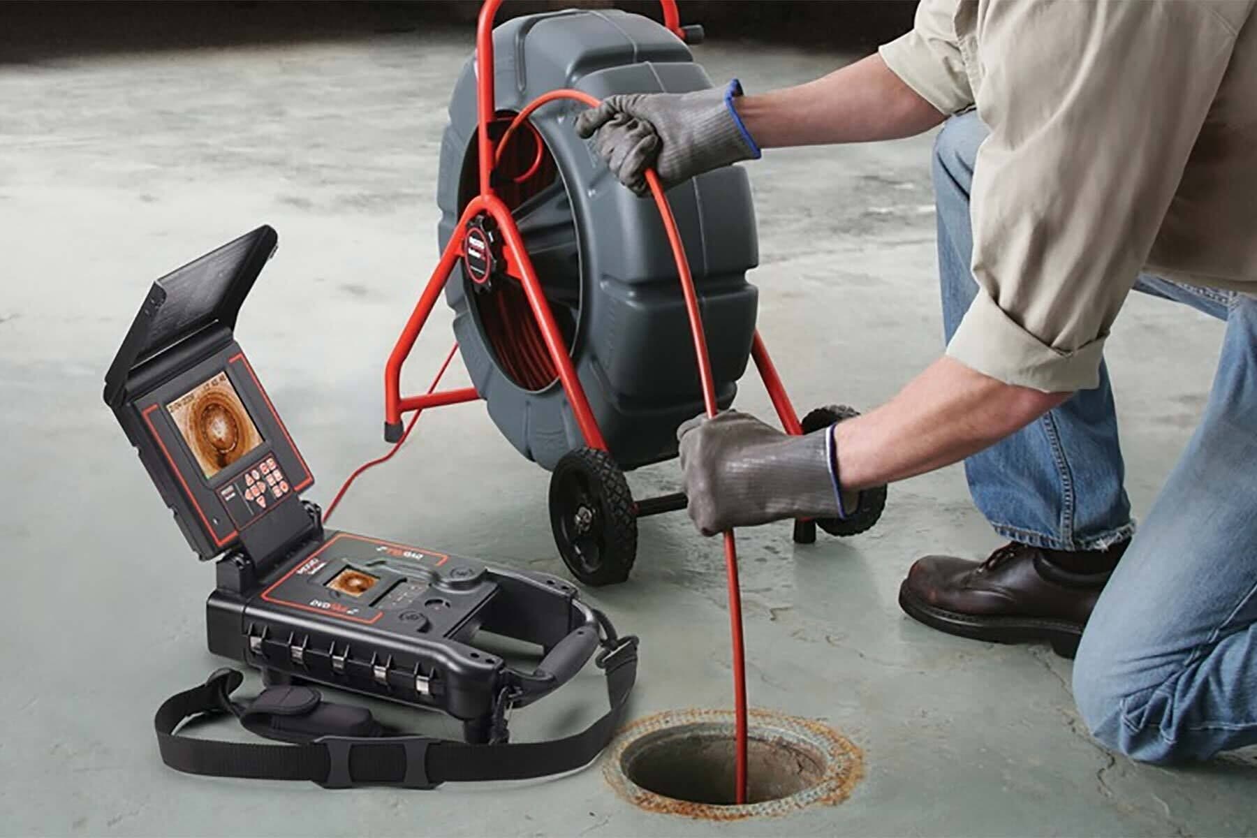Inspecting a sewer line with a push camera